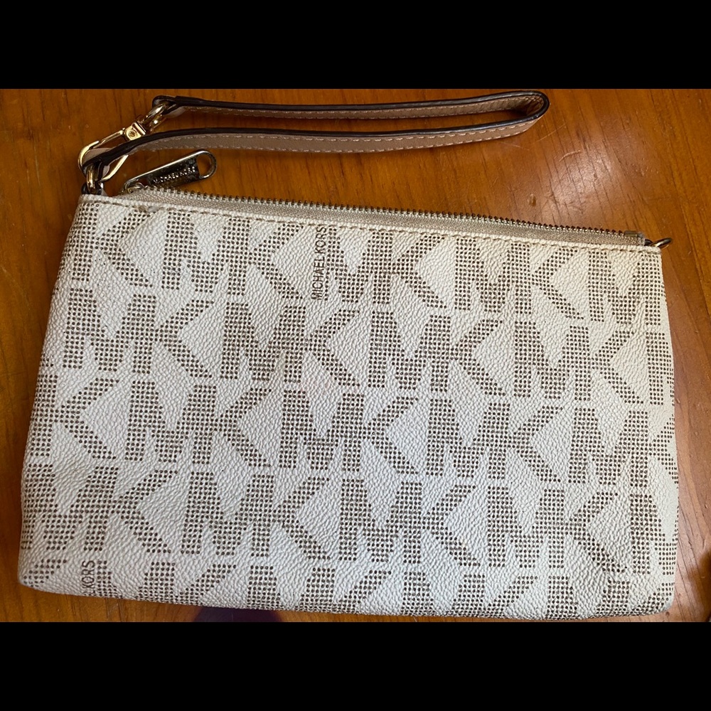 Medium sized White Michael Kors wristlet. - Picture 3 of 6